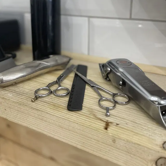 Clippers and scissors at 233.Barbers