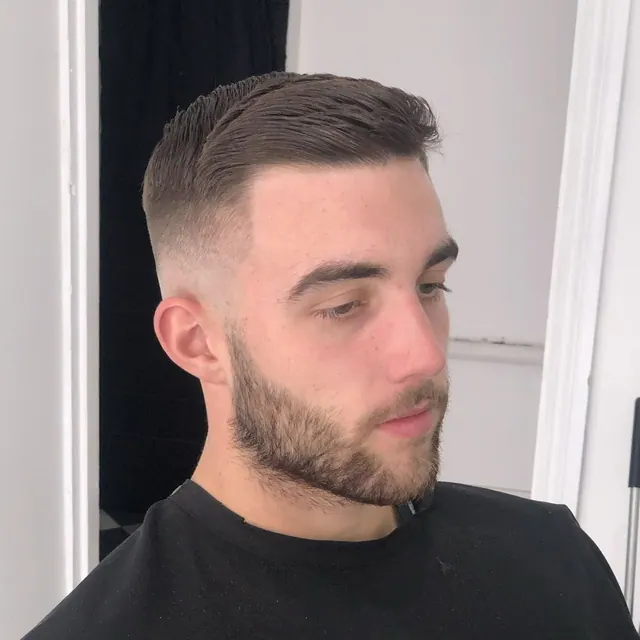 A fade and beard at 233.Barbers